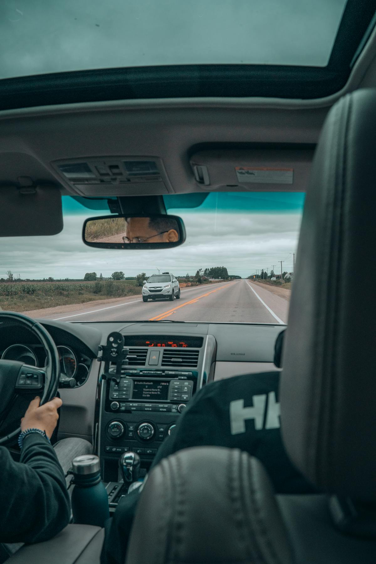 View through a windshield on a road trip